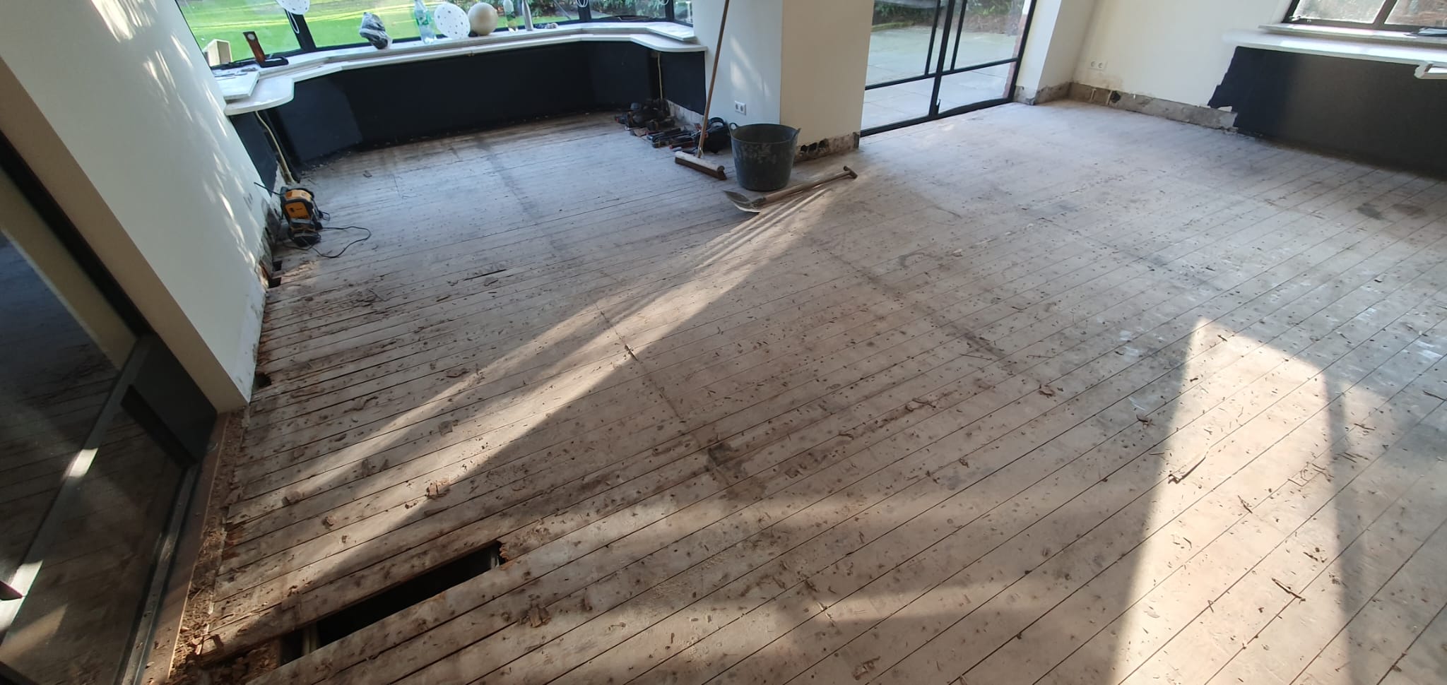 Damaged parquet floor before replacement